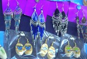 Pairs of earrings for sale at a roadside stand in Costa Rica.