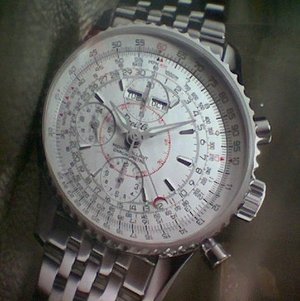 Breitling Navitimer Montbrillant, a typical pilot watch. Quantum on hand, day of the week, month, slide rule, chronometer certified.