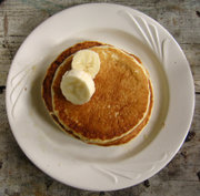 North Americans (The United States and Canada) sometimes style pancakes with banana slices.