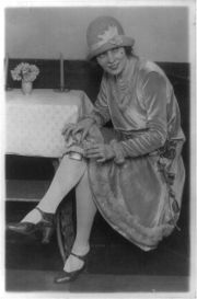 Hip flask tucked into a garter belt during Prohibition