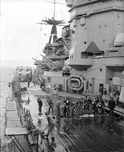 Nested Carley floats visible on HMS Rodney