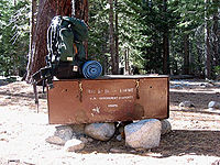 A stationary steel food storage box at a campsite. Popular destinations equipped with these enable backpackers to do without a bear canister.