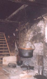 18th-century cooks tended a fire and endured smoke in this Swiss farmhouse smoke kitchen.