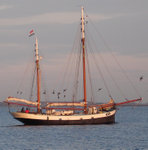 A sailing ship at anchor.